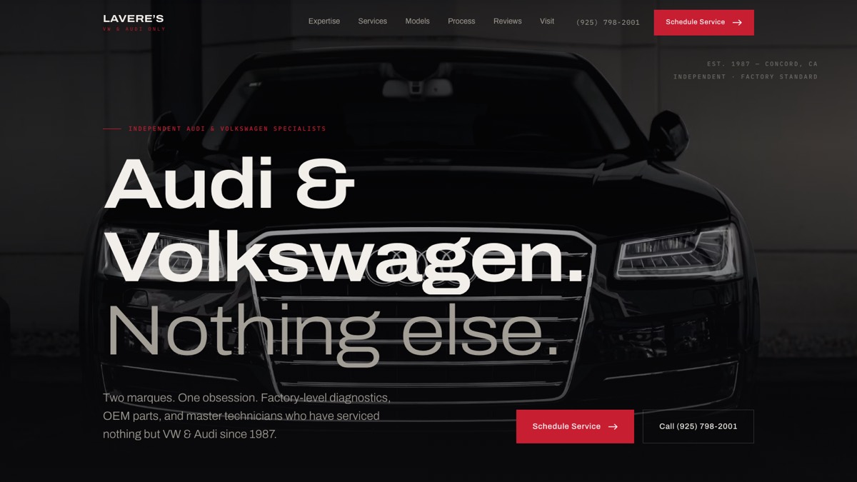The redesigned LaVere's homepage: near-black cinematic hero with a dark Audi, bold editorial headline and a prominent Schedule Service button